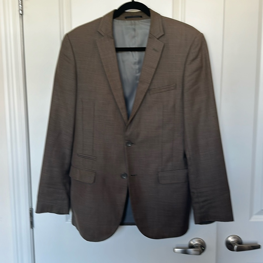 Men’s Blazer. Purchased at Harold’s in UK. Lightly worn. Great condition!